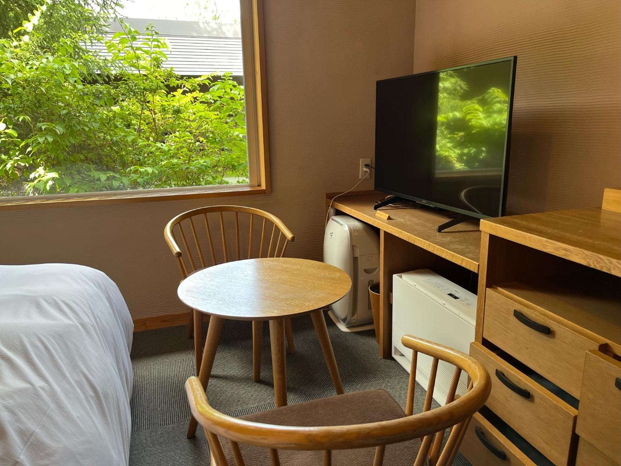 Miyama Ouan Kyoritsu Resort Takayama (Gifu) Quarto foto A room at the hotel