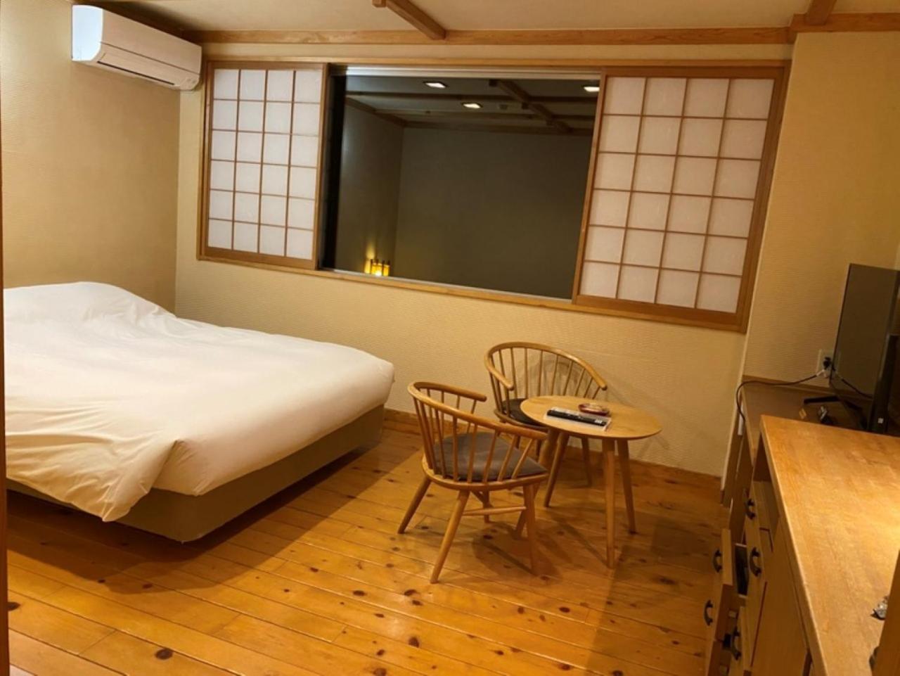 Miyama Ouan Kyoritsu Resort Takayama (Gifu) Exterior foto A room at a ryokan